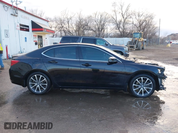 2015 Acura TLX Advance z VIN 19UUB3F72FA010258, wystawiony jako IAAI lot #41208796 z przebiegiem 158 125 mil mil oraz . Historia ofert i sprzedaży dostępna na DreamBid. Obrazek 14.