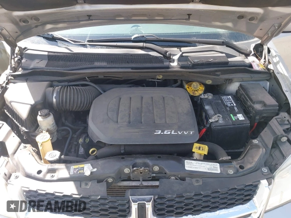 2016 Dodge Grand Caravan SXT with VIN 2C4RDGCG9GR180396, listed as a IAAI auction lot 41921312 with 130,256 mi miles and . Bid and sale history available at DreamBid. Image 10.