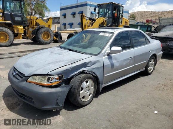 2002 Honda Accord EX z VIN 1HGCG16572A069123, wystawiony jako Copart lot #55861375 z przebiegiem 117 455 mil mil oraz Szkoda całkowita • Salvage title. Historia ofert i sprzedaży dostępna na DreamBid. Obrazek 1.