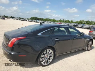 2014 Jaguar XJ with VIN SAJWA2GT0EMV61531, listed as a Copart auction lot 61071054 with 79,266 mi miles and Clean Title. Bid and sale history available at DreamBid. Image 3.