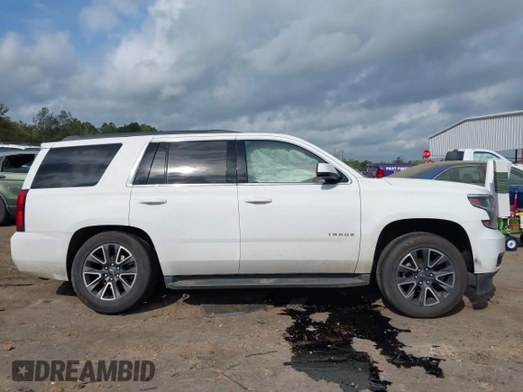 2017 Chevrolet Tahoe LS with VIN 1GNSCAKC5HR312729, listed as a IAAI auction lot 41928484 with 206,999 mi miles and . Bid and sale history available at DreamBid. Image 13.
