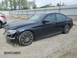 2018 BMW 5 Series 540i with VIN WBAJE5C53JWA94657, listed as a Copart auction lot 51058014 with 63,460 mi miles and Salvage Title. Bid and sale history available at carsss.com. Image 1.