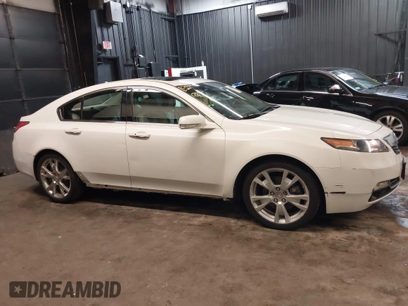2013 Acura TL Advance z VIN 19UUA9F74DA003069, wystawiony jako IAAI lot #42281080 z przebiegiem 62 521 mil mil oraz . Historia ofert i sprzedaży dostępna na DreamBid. Obrazek 13.