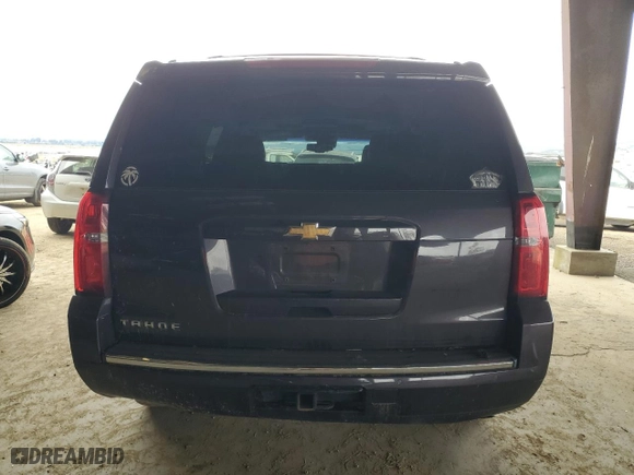 2016 Chevrolet Tahoe LTZ with VIN 1GNSKCKC2GR277192, listed as a Copart auction lot 49552145 with 131,659 mi miles and Salvage Title. Bid and sale history available at carsss.com. Image 6.