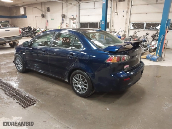 2013 Mitsubishi Lancer SE with VIN JA32V2FW9DU005616, listed as a IAAI auction lot 41247087 with 129,055 mi miles. Bid and sale history available at carsss.com. Image 3.