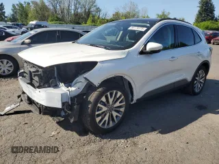 2020 Ford Escape Titanium Hybrid z VIN 1FMCU9DZ8LUC54546, wystawiony jako Copart lot #56179375 z przebiegiem 30 760 mil mil oraz Szkoda całkowita • Salvage title. Historia ofert i sprzedaży dostępna na DreamBid. Obrazek 1.