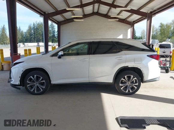 2021 Lexus RX with VIN JTJHZKFA2M2030841, listed as a IAAI auction lot 42009263 with 38,113 mi miles. Bid and sale history available at carsss.com. Image 15.
