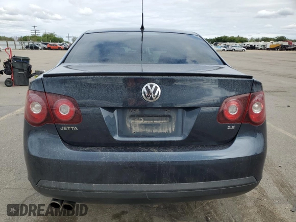 2010 Volkswagen Jetta Limited Edition with VIN 3VWRZ7AJ0AM099928, listed as a Copart auction lot 57291895 with 118,451 mi miles and Salvage title. Bid and sale history available at DreamBid. Image 6.