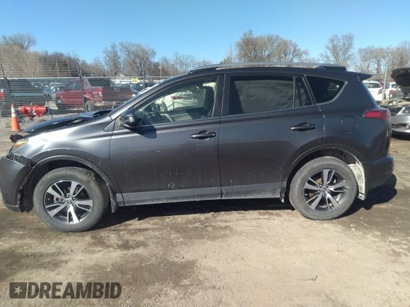 2018 Toyota RAV4 XLE with VIN JTMRFREV9JJ742276, listed as a IAAI auction lot 41855530 with 115,815 mi miles. Bid and sale history available at carsss.com. Image 14.