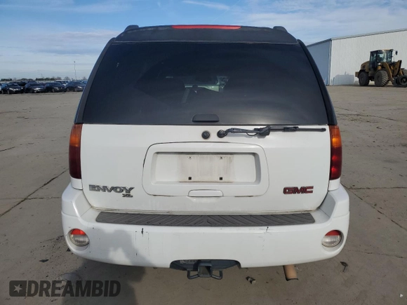 2003 GMC Envoy XL SLE with VIN 1GKET16S532130221, listed as a Copart auction lot 87108784 with 217,821 mi miles and Salvage Title. Bid and sale history available at carsss.com. Image 6.