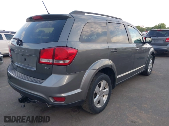 2012 Dodge Journey SXT with VIN 3C4PDDBG2CT333537, listed as a IAAI auction lot 42556329 with 172,834 mi miles and . Bid and sale history available at DreamBid. Image 4.