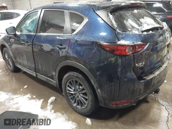 2020 Mazda CX-5 Touring z VIN JM3KFBCM9L0843045, wystawiony jako IAAI lot #41361008 z przebiegiem 76 107 mil mil oraz . Historia ofert i sprzedaży dostępna na DreamBid. Obrazek 3.
