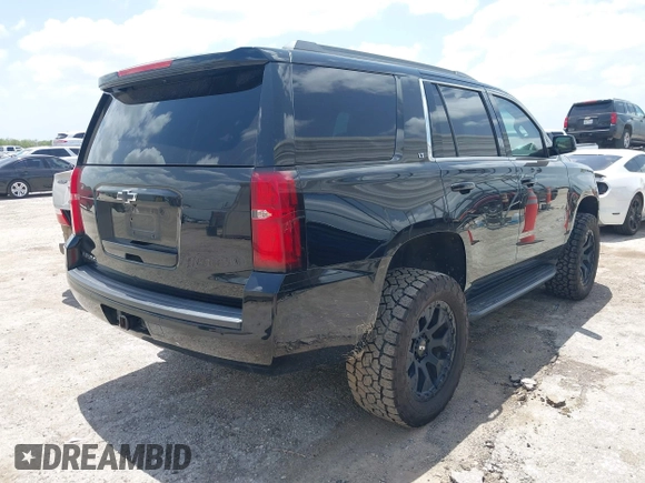 2018 Chevrolet Tahoe LT with VIN 1GNSCBKC9JR133640, listed as a IAAI auction lot 42542381 with 130,154 mi miles and . Bid and sale history available at DreamBid. Image 4.