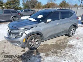 2021 Kia Seltos S with VIN KNDEUCA22M7122562, listed as a IAAI auction lot 41405013 with 91,032 mi miles. Bid and sale history available at carsss.com. Image 2.