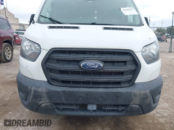 2020 Ford Transit Cargo with VIN 1FTYE1Y87LKA39598, listed as a IAAI auction lot 40989107 with 267,407 mi miles and . Bid and sale history available at DreamBid. Image 6.