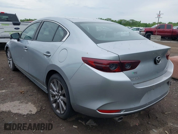 2020 Mazda 3 Select with VIN 3MZBPACL0LM131878, listed as a IAAI auction lot 42274393 with 105,656 mi miles and . Bid and sale history available at DreamBid. Image 3.