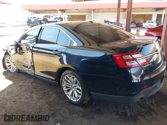2015 Ford Taurus Limited with VIN 1FAHP2F8XFG135452, listed as a IAAI auction lot 42003510 with 71,476 mi miles. Bid and sale history available at carsss.com. Image 3.