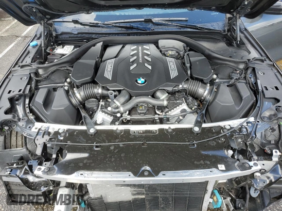 2025 BMW 8 Series M850i with VIN WBAGV8C07SCT18237, listed as a Copart auction lot 49277375 with 750 mi miles and Salvage title. Bid and sale history available at DreamBid. Image 11.