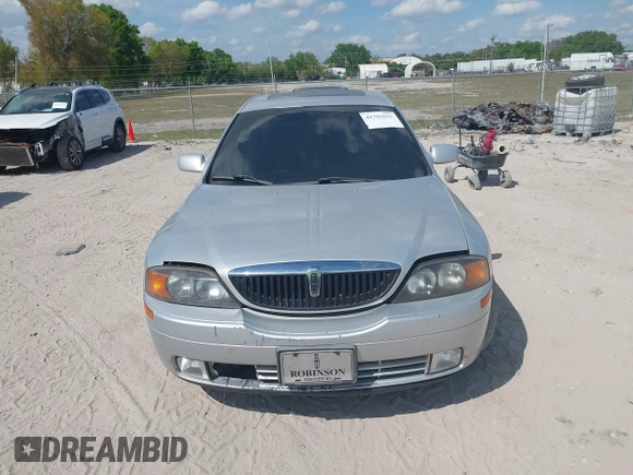 2000 Lincoln LS with VIN 1LNHM87A4YY886613, listed as a IAAI auction lot 41793515 with 144,061 mi miles. Bid and sale history available at carsss.com. Image 6.