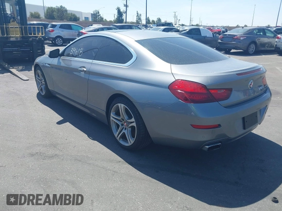 2013 BMW 6 Series 650i with VIN WBAYM9C53DDW20145, listed as a IAAI auction lot 42039618 with 66,684 mi miles and . Bid and sale history available at carsss.com. Image 3.