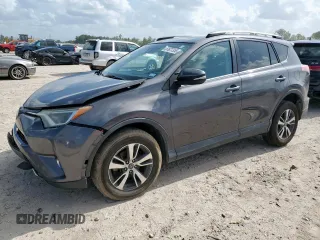 2018 Toyota RAV4 XLE with VIN 2T3WFREV2JW409292, listed as a Copart auction lot 61577355 with 189,258 mi miles and Salvage title. Bid and sale history available at DreamBid. Image 1.