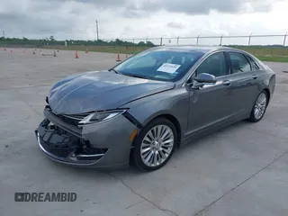 2014 Lincoln MKZ z VIN 3LN6L2G99ER834840, wystawiony jako IAAI lot #42134656 z przebiegiem 33 565 mil mil oraz . Historia ofert i sprzedaży dostępna na DreamBid. Obrazek 2.