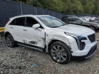 2020 Cadillac XT4 AWD Premium Luxury with VIN 1GYFZDR40LF086211, listed as a Copart auction lot 75734134 with 75,275 mi miles and Salvage title. Bid and sale history available at DreamBid. Image 4.