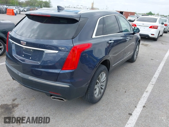 2019 Cadillac XT5 Luxury FWD with VIN 1GYKNCRS7KZ199542, listed as a IAAI auction lot 42032139 with 79,487 mi miles and . Bid and sale history available at DreamBid. Image 4.