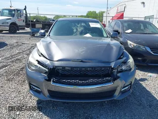 2014 Infiniti Q50 Premium z VIN JN1BV7AR0EM700278, wystawiony jako IAAI lot #42043943 z przebiegiem 107 369 mil mil oraz . Historia ofert i sprzedaży dostępna na DreamBid. Obrazek 12.