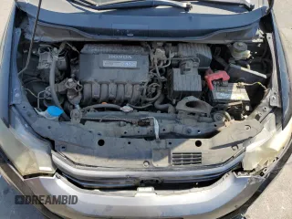 2010 Honda Insight LX with VIN JHMZE2H59AS041185, listed as a Copart auction lot 64517415 with 208,242 mi miles and Salvage title. Bid and sale history available at DreamBid. Image 11.