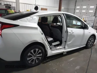 2021 Toyota Prius LE with VIN JTDL9MFU9M3025214, listed as a IAAI auction lot 41375860 with 76,259 mi miles and . Bid and sale history available at DreamBid. Image 6.