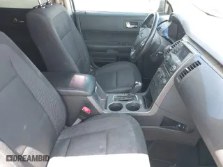 2014 Ford Flex SE with VIN 2FMGK5B87EBD32107, listed as a IAAI auction lot 42036109 with 150,639 mi miles. Bid and sale history available at carsss.com. Image 5.
