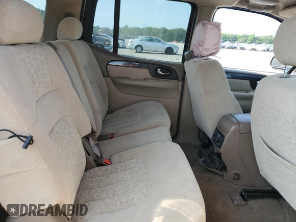 2004 GMC Envoy SLE z VIN 1GKET16S946198449, wystawiony jako Copart lot #58758375 z przebiegiem 102 946 mil mil oraz Szkoda całkowita • Salvage title. Historia ofert i sprzedaży dostępna na DreamBid. Obrazek 11.