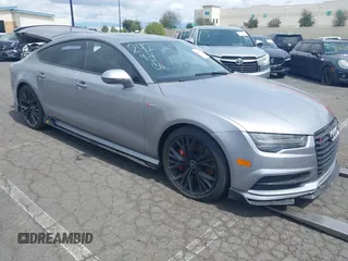 2016 Audi A7 3.0 Prestige with VIN WAU2GAFCXGN013022, listed as a IAAI auction lot 41651979 with 1 mi miles. Bid and sale history available at carsss.com. Image 1.