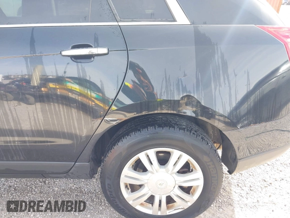 2012 Cadillac SRX Luxury Collection with VIN 3GYFNAE37CS651847, listed as a IAAI auction lot 41929524 with 144,961 mi miles and . Bid and sale history available at carsss.com. Image 6.