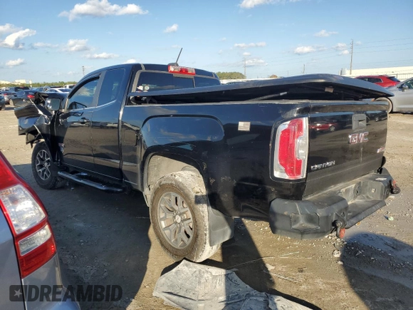 2015 GMC Canyon 4WD SLE with VIN 1GTH6BE33F1199189, listed as a Copart auction lot 87191114 with 199,477 mi miles and Salvage Title. Bid and sale history available at carsss.com. Image 2.
