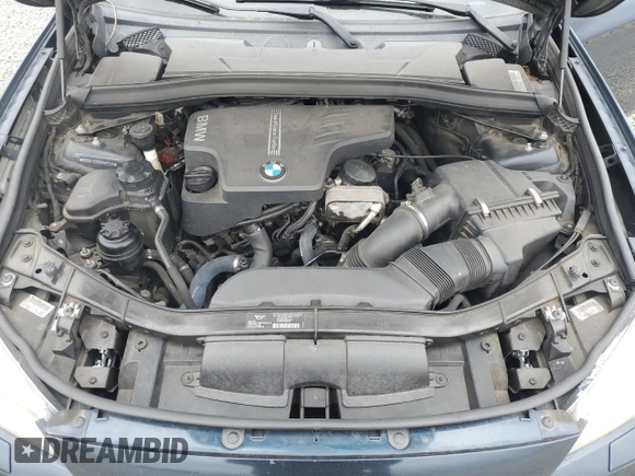 2013 BMW X1 xDrive28i z VIN WBAVL1C5XDVR85326, wystawiony jako Copart lot #58524225 z przebiegiem 138 389 mil mil oraz Szkoda całkowita • Salvage title. Historia ofert i sprzedaży dostępna na DreamBid. Obrazek 12.