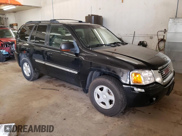 2003 GMC Envoy SLT with VIN 1GKDT13S732208692, listed as a Copart auction lot 67475514 with 243,146 mi miles and Salvage Title. Bid and sale history available at carsss.com. Image 4.