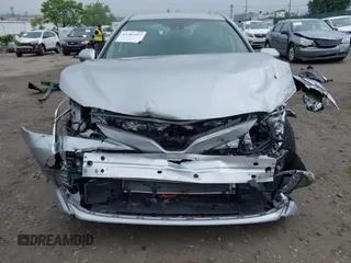 2019 Toyota Camry LE z VIN 4T1B11HK5KU813553, wystawiony jako IAAI lot #42282507 z przebiegiem 22 100 mil mil oraz . Historia ofert i sprzedaży dostępna na DreamBid. Obrazek 6.