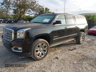 2019 GMC Yukon XL Denali with VIN 1GKS2HKJ2KR226275, listed as a IAAI auction lot 41552828 with 82,069 mi miles. Bid and sale history available at carsss.com. Image 2.