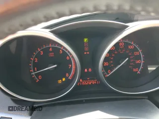2010 Mazda 3 S Sport z VIN JM1BL1H65A1159364, wystawiony jako Copart lot #54788735 z przebiegiem 211 552 mil mil oraz Szkoda całkowita • Salvage title. Historia ofert i sprzedaży dostępna na DreamBid. Obrazek 9.
