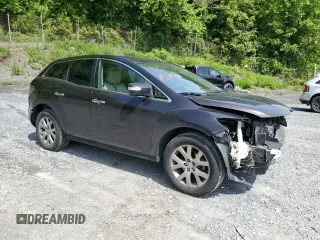 2009 Mazda CX-7 Grand Touring z VIN JM3ER29L390223853, wystawiony jako Copart lot #58481345 z przebiegiem 130 540 mil mil oraz Szkoda całkowita • Salvage title. Historia ofert i sprzedaży dostępna na DreamBid. Obrazek 4.