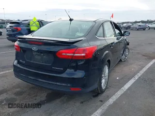2018 Ford Focus Titanium с VIN 1FADP3J2XJL294107, выставлен на аукционе IAAI как лот 42005814 с пробегом 93 239 миль миль и . История ставок и продаж доступна на DreamBid. Изображение 4.