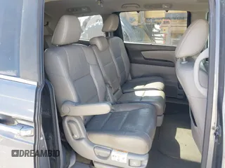 2012 Honda Odyssey EX-L with VIN 5FNRL5H69CB128585, listed as a IAAI auction lot 41695109 with 231,565 mi miles and . Bid and sale history available at carsss.com. Image 8.