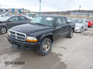 2004 Dodge Dakota Sport with VIN 1D7HL38N24S768283, listed as a IAAI auction lot 41635910 with 328,505 mi miles. Bid and sale history available at carsss.com. Image 2.