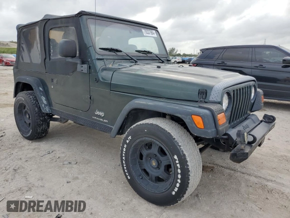 2003 Jeep Wrangler SE with VIN 1J4FA29103P313229, listed as a Copart auction lot 79337984 with 135,668 mi miles and Salvage title. Bid and sale history available at DreamBid. Image 4.