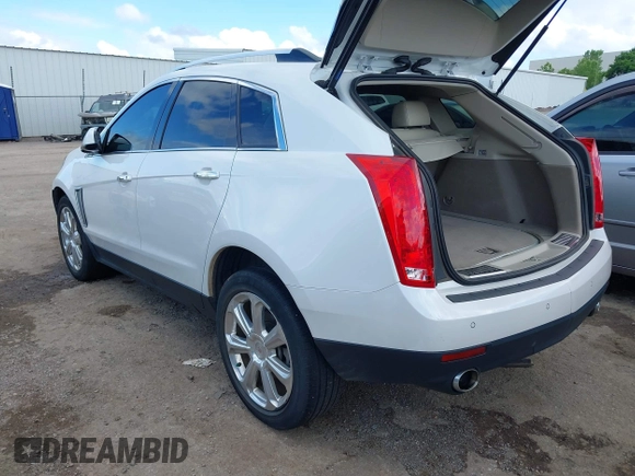 2015 Cadillac SRX Premium Collection with VIN 3GYFNDE37FS627697, listed as a IAAI auction lot 42354811 with 64,135 mi miles and . Bid and sale history available at DreamBid. Image 3.