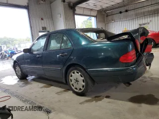 1998 Mercedes-Benz E-Class with VIN WDBJF65F6WA590094, listed as a Copart auction lot 72751984 with 196,048 mi miles and Salvage Title. Bid and sale history available at carsss.com. Image 2.