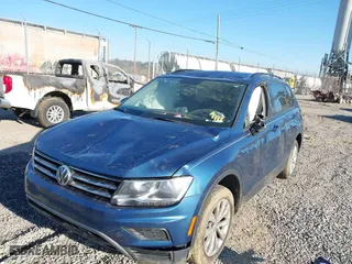 2019 Volkswagen Tiguan S with VIN 3VV0B7AX6KM067699, listed as a IAAI auction lot 41634351 with 181,093 mi miles. Bid and sale history available at carsss.com. Image 6.