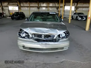 2002 Infiniti I35 Luxury z VIN JNKDA31A22T022606, wystawiony jako Copart lot #55158005 z przebiegiem 136 847 mil mil oraz Szkoda całkowita • Salvage title. Historia ofert i sprzedaży dostępna na DreamBid. Obrazek 13.